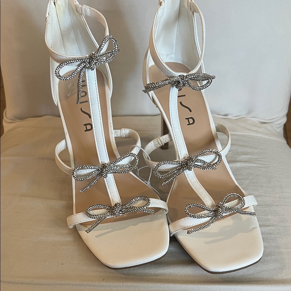 Unisa White Heels with Silver Bow Accents
